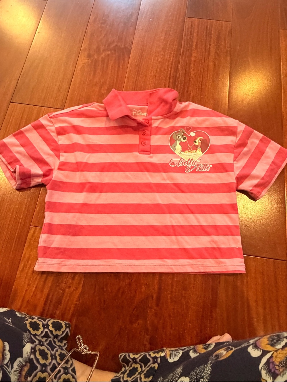 Vintage-style Disney Lady and the Tramp polo shirt in adorable pink and coral st